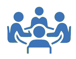 Fyra personer som sitter i en ring runt ett bord.